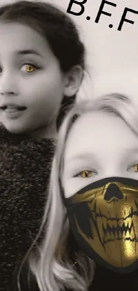 This dynamic live wallpaper features a striking black and white image of two mask-wearing girls enhanced by a bold color filter