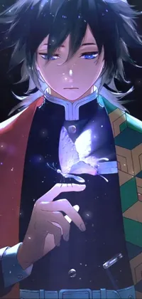 This phone live wallpaper features a stunning close up of a hand holding a butterfly, surrounded by star-filled mage robes