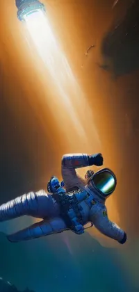 This phone live wallpaper features an astronaut in a space suit soaring through the air towards Saturn, filling the viewer with a sense of wonder and adventure