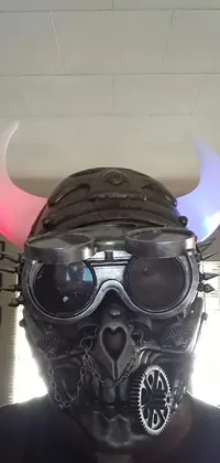 This live wallpaper is a work of art, showcasing a man wearing a gas mask with horns on his head