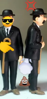 This phone live wallpaper features two standing figurines engaged in a conversation