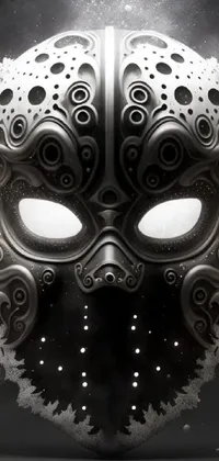 This live wallpaper features a digitally illustrated metal mask in stunning 3D detail