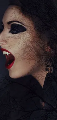If you&#39;re into gothic and horror themes, you&#39;ll love this phone live wallpaper featuring a woman&#39;s close-up face with a tree backdrop