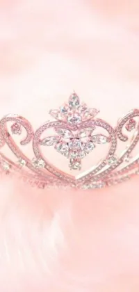 This live wallpaper features a stunning tiara set atop a pink fur with a light pink background and sparkling white diamonds