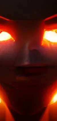 This captivating live wallpaper showcases glowing eyes and digital art, featuring a lava and fire goddess, a pumpkin head figure and a still from an animated movie