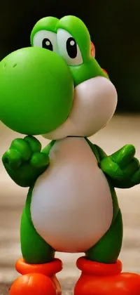 This vibrant phone live wallpaper features a green and white Yoshi toy figure, known for being a popular character in Nintendo's video games