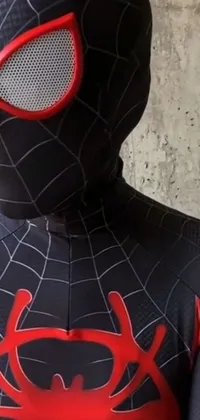 Get this high-quality live wallpaper for your phone featuring an intricate Spider-man costume in black with intricate webbing and spider symbols