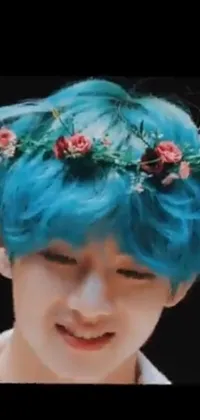 This live phone wallpaper showcases a close up of a person with blue hair wearing a flower crown