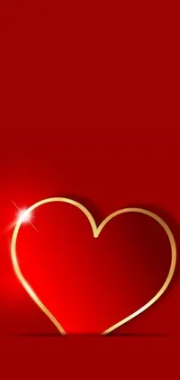 Looking for an eye-catching phone live wallpaper for your device? Check out this stunning golden heart against a vibrant red background! Created by a renowned artist, this minimalist masterpiece brings attention to the heart's beautiful design, set against a gradient background