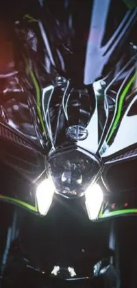 Rev up your smartphone with this <a href="/">dynamic live wallpaper</a> featuring a close-up shot of a Kawasaki motorcycle