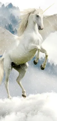 This phone live wallpaper portrays a beautiful white horse standing on its hind legs amidst snowy mountains