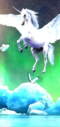 Transform your smartphone into a mystical and stunning landscape with electric cats flying over the ice and a brilliant white unicorn soaring over serene waters in this phone's live wallpaper