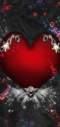 This black and red live phone wallpaper features a stunning winged heart surrounded by sparkling crystals