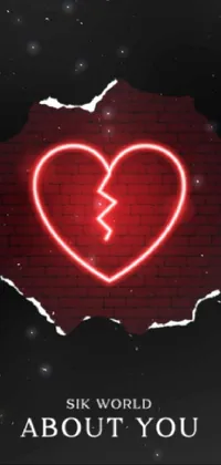 This live wallpaper showcases a visually striking broken heart graphic surrounded by the phrase "six world about you" in bold font