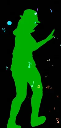This phone live wallpaper features a green silhouette of a dancing figure surrounded by musical notes