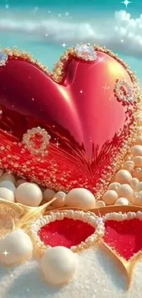 Bring some romance to your phone with this stunning live wallpaper featuring a red heart on a sandy beach, with sparkling jewels