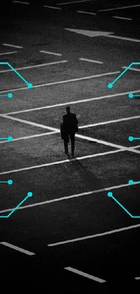 This live wallpaper depicts a lone figure standing in the center of a sprawling parking lot, surrounded by a vast network of connections