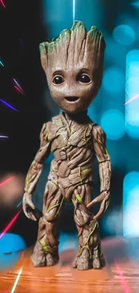 Looking for a lively and colorful phone live wallpaper? Check out this high-quality scan of a toy Groot from Guardians of the Galaxy