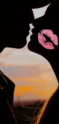 This romantic live wallpaper features a picturesque sunset with a lovely couple sharing a passionate kiss