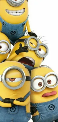This live wallpaper features a group of bright yellow minions wearing blue overalls with various facial expressions standing next to each other on a clear blue sky background