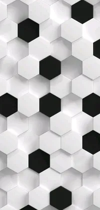 This stunning phone live wallpaper features a display of black and white hexagons arranged in a unique pattern