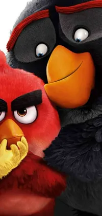 This phone live wallpaper features two colorful angry birds standing together against a background of a Cerebri movie poster