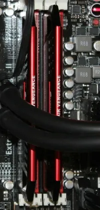 This live wallpaper features a computer motherboard with a golden bitcoin, set against a black and crimson color scheme