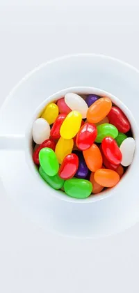 This live wallpaper showcases a delightful bowl of jelly beans on a white plate in a striking pop art style