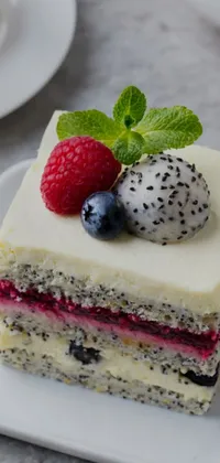This live wallpaper for phones features a luscious, colorful close-up photo of a piece of cake on a plate