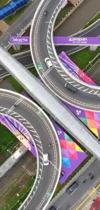 This dynamic phone live wallpaper showcases an urban scene of a busy highway interchange