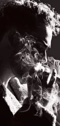 This live wallpaper features a black and white photograph of a person smoking