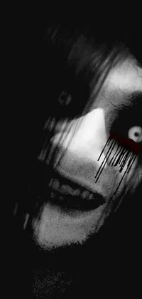 Looking for a creepy and frightening phone wallpaper? Look no further than this black and white close-up portrait of a person with blood running down their eyes