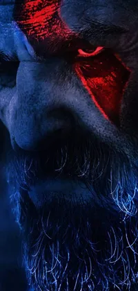Decorate your phone display with this hauntingly beautiful live wallpaper featuring a close-up image of a man with red eyes