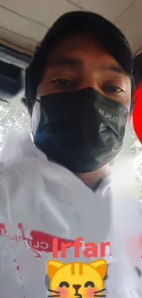 This live phone wallpaper depicts a person wearing a face mask in a close-up view