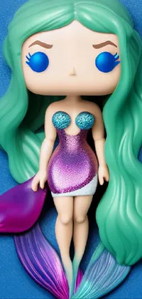 This live phone wallpaper features a colorful mermaid figurine in shades of mauve and cyan inspired by pop art and Funko Pop figurines