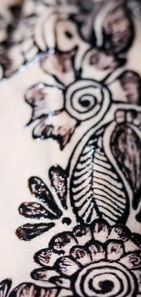 This live wallpaper features a stunning close-up of a henna tattoo on an arm