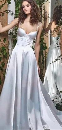 This stunning phone live wallpaper features a beautiful woman posing in a white wedding dress