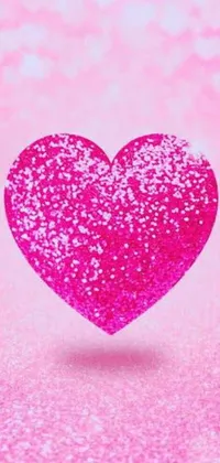 The Pink Heart Live Wallpaper is a delightful and feminine option for mobile devices