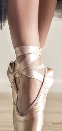 This live phone wallpaper showcases a stunning close-up view of ballet shoes in satin