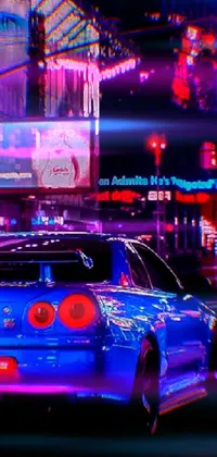 This phone live wallpaper showcases a blue Nissan GTR R 3 4 car cruising through a luminous cityscape