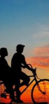 This live wallpaper features an animated, romantic couple on the back of a bike, with a beautiful sunset and vivid colors