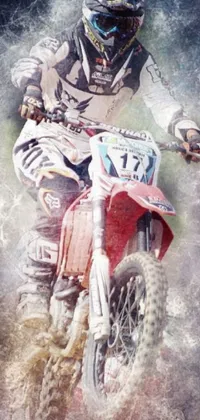 This phone live wallpaper features a stunning digital airbrush painting of a dirt bike rider