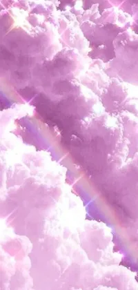 Introducing a stunning phone live wallpaper, featuring a delightful lilac background illuminated by a gorgeous rainbow in the sky above the clouds