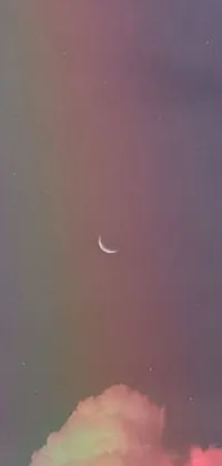 This live wallpaper features a mesmerizing rainbow sky background with a tranquil crescent in the center