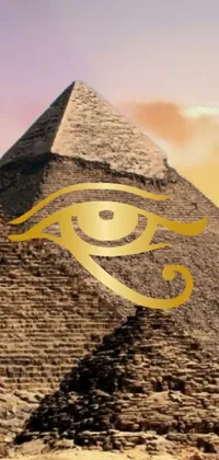 This phone live wallpaper features a captivating pyramid design with a prominent golden eye at the forefront