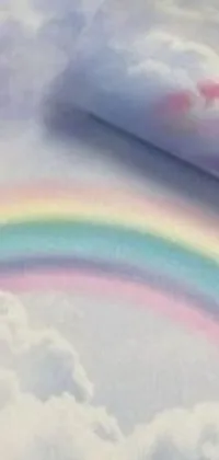 This live wallpaper features a magical pastel rainbow in the sky