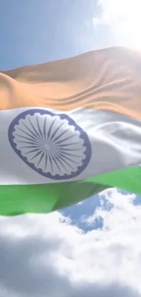This live wallpaper showcases a digital rendering of the Indian flag against a clear, blue sky