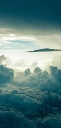 This phone live wallpaper features a magical airplane flying high among beautiful, puffy clouds