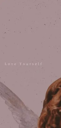This live wallpaper for your phone features a beautiful image of an angel holding up a banner that reads "love yourself