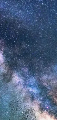 This stunning live wallpaper for your phone features a mesmerizing nighttime scene with twinkling stars filling up the sky